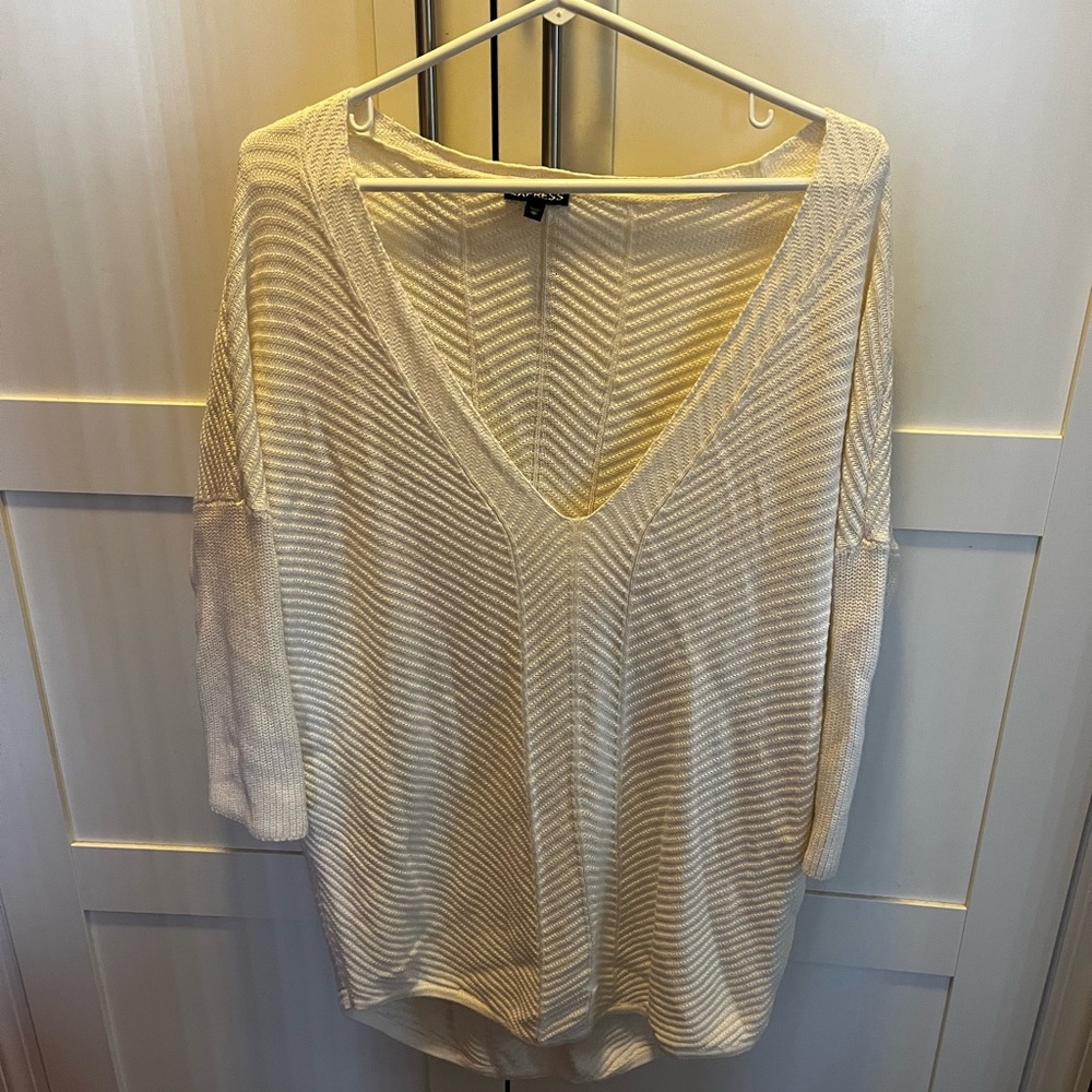 White high-low sweater